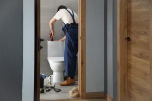 male-plumber-working-fix-problems-client-s-house (1)